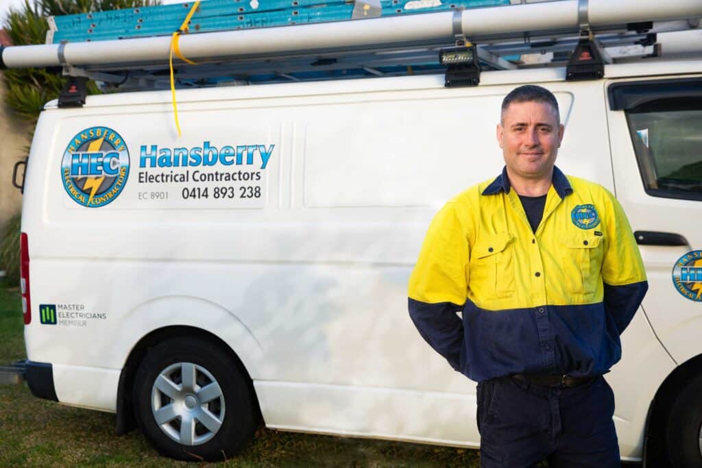 Ben Hansberry in front of van